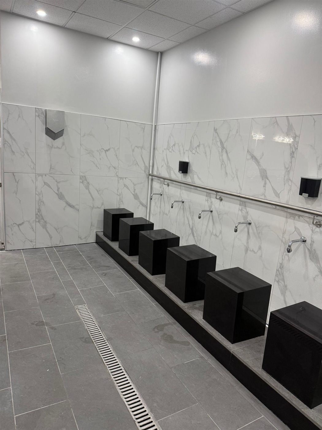 Custom ablution station with marble tile